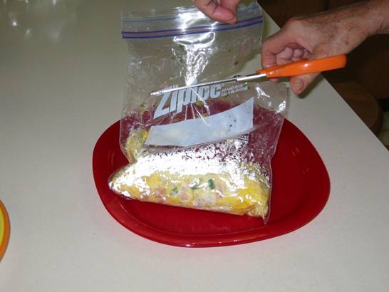 Ziploc Omelet - Cutting bag open after boiling